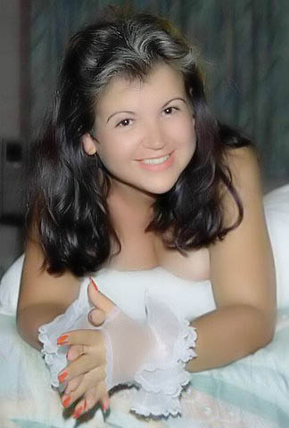 <Anita Lopez has a very pretty face and a beautiful smile>